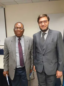 Amicarelli with Solomon Asemota, Queen's Counsellor