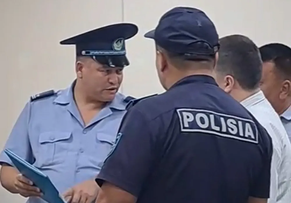 Colonel Baglan Yankin leads Police Kentau raid JW
