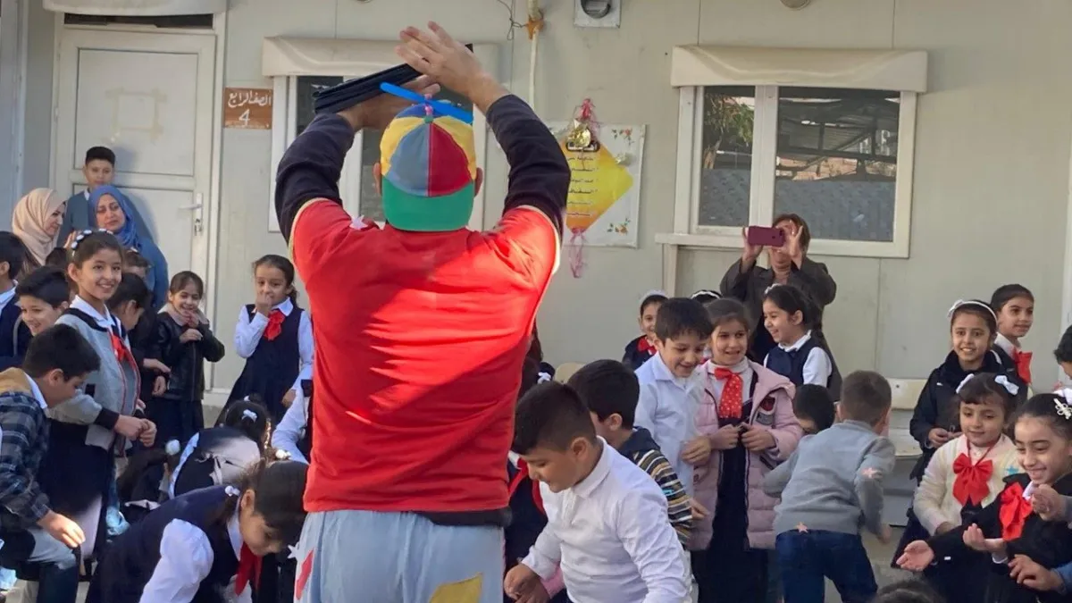 A clown runs a workshop
